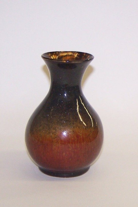 ***TECO ART POTTERY VASE: Brown to green, impressed ''Teco'' on base, approximate height 5 1/8''.