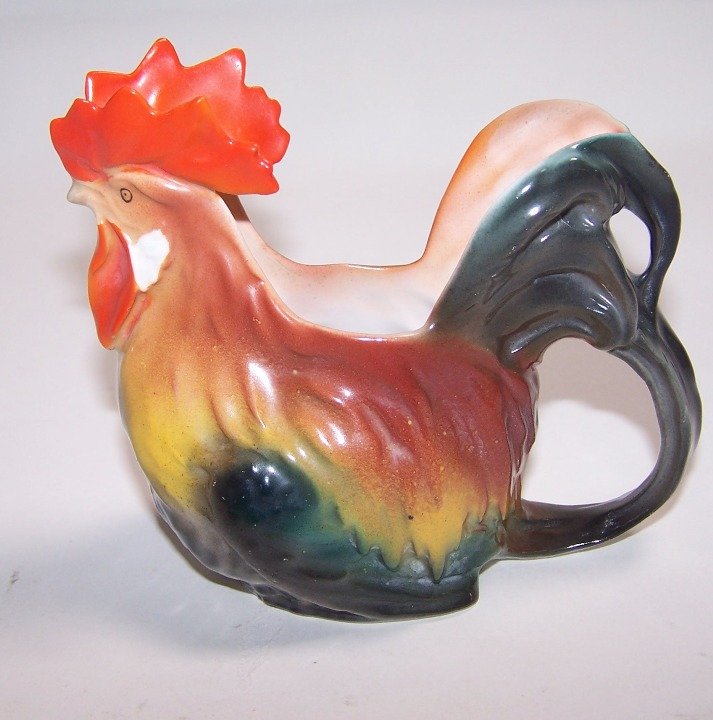 ROYAL BAYREUTH FIGURAL CREAMER: Depicting rooster, approximate height 4 1/8''.