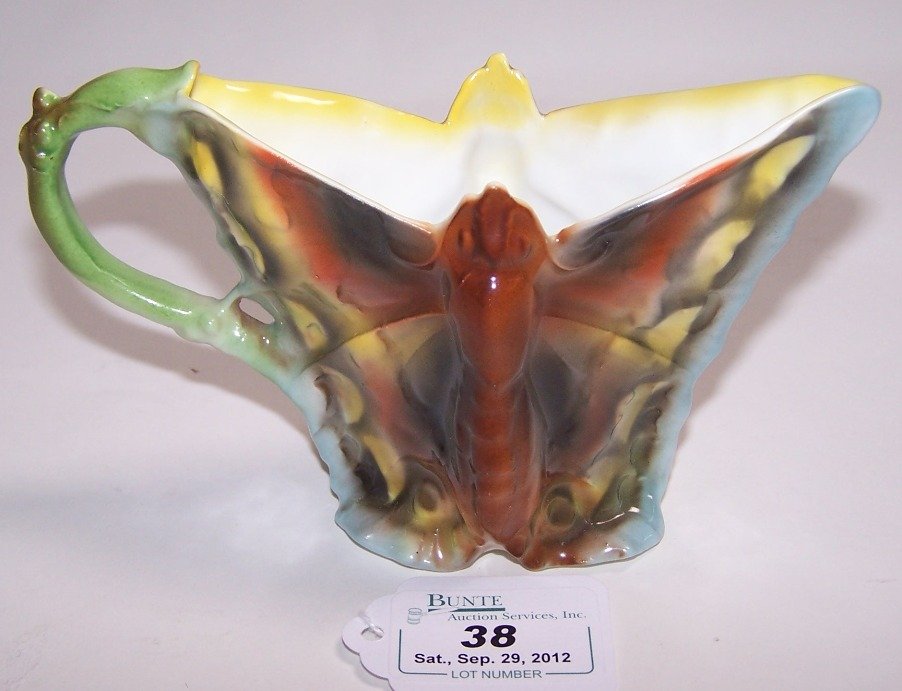 ROYAL BAYREUTH FIGURAL CREAMER: Depicting butterfly with open wings, approximate height 3 5/8''.