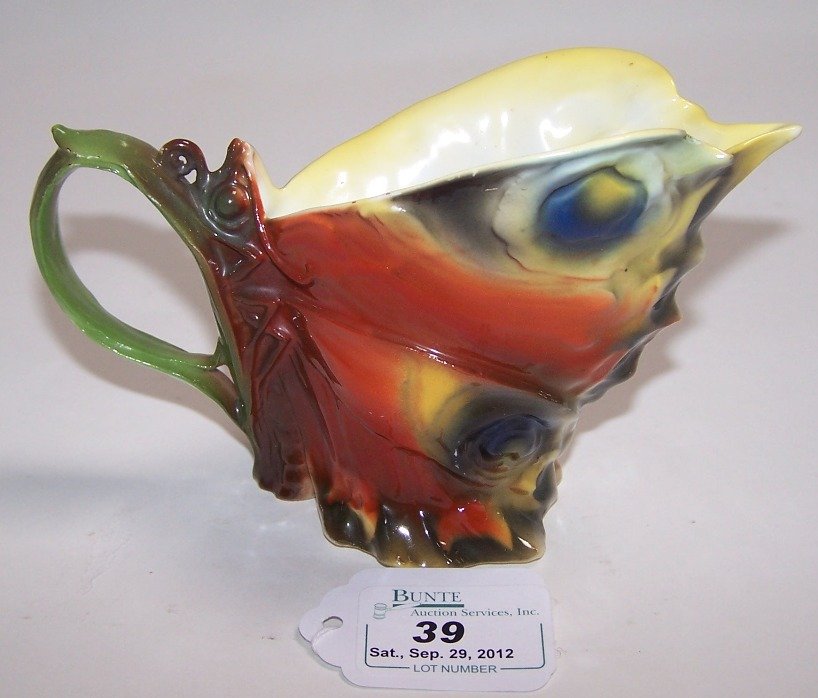 ROYAL BAYREUTH FIGURAL CREAMER: Depicting butterfly with closed wings, approximate height 3 7/8''.