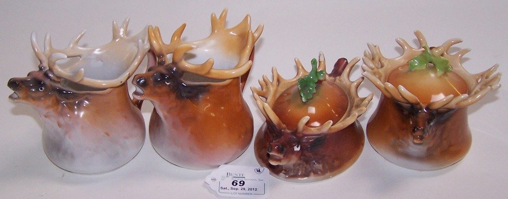 FOUR PIECES ROYAL BAYREUTH: Two creamers and two covered figural bowls, all elk pattern, tallest being 4 3/8''.