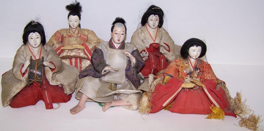***FIVE JAPANESE DOLLS: Four women and one man, tallest piece being approximately 4 1/4''.