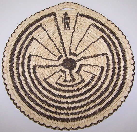 PAPAGO TRAY: With single handle, man in maze, approximate diameter 12''.
