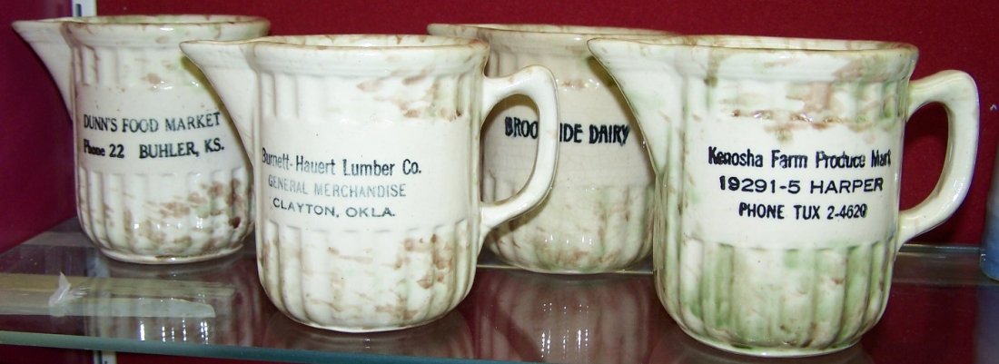 ***FOUR SPATTERWARE ADVERTISING CREAMERS: ''Dunn's Food Market Phone 22 Buhler, KS.'', ''Burnett-Hauert Lumber Co. General Merchandise Clayton, Okla.'', ''Brookside Dairy'', ''Kenosha Farm Produce Mart 19291-5 Harper phone Tux 2-4620'', appro