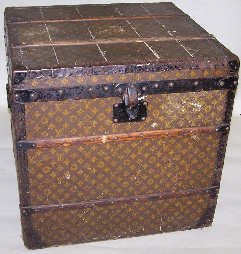 ***LOUIS VUITTON TRUNK: With fitted interior, serial #183596, approximate height 25'', width 25 1/2'', depth 24 1/2''.