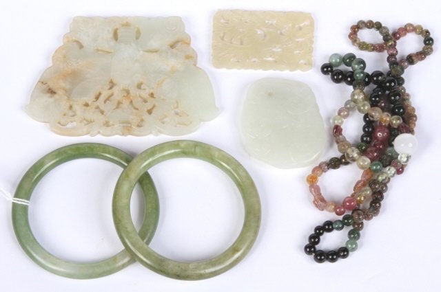 *GROUP OF CHINESE CARVED JADE: Comprising 3 carved jade pendants, 2 carved jade bangle bracelets and a gemstone bead necklace.