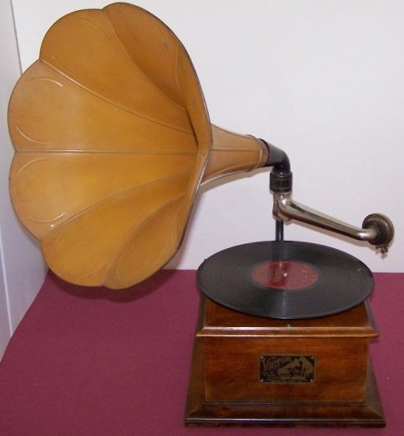 *VICTOR TALKING MACHINE: Having walnut case, horn, tag marked "Victor Talking Machine Co type VIC 0, #563".