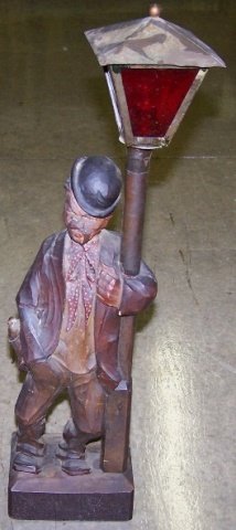 *HAND CARVED FIGURAL WHISTLER: Depicting vagabond leaning against lamp post, approximate height 18".