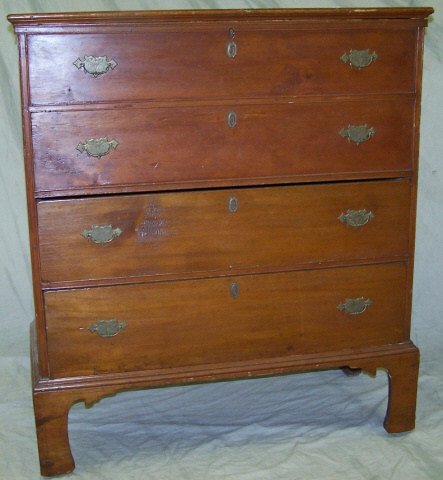 19TH C. AMERICAN PRIMITIVE BLANKET CHEST: Having hinged top opening to storage area over 2 faux drawers and 2 drawers, raised on bracket feet, approximate height 46 1/2", width 40 1/2", depth 18 1/2".