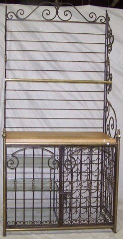 WROUGHT IRON BAKER'S RACK: Butcher block style shelf over 3 glass shelves and wine rack, approximately 7'6" high, 44" wide, 26" deep