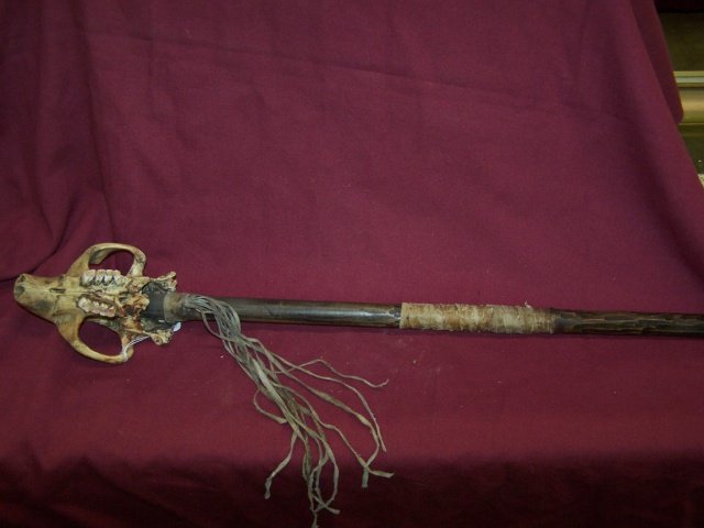 *NATIVE AMERICAN MEDICINE MAN'S SCEPTER: Having skull top, wood handle and leather fringe.