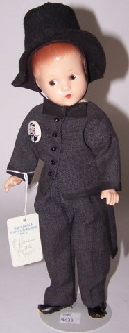 *EFFANBEE COMPOSITION DOLL: Suzette, with molded hair and painted eyes and mouth, marked on back "Suzette Effanbee," approximate height without hat 11".