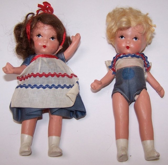 *2 NANCY ANN BISQUE DOLLS: Brother and sister, both marked on back "Judy Ann, USA," circa 1938, approximate height 5 1/4".