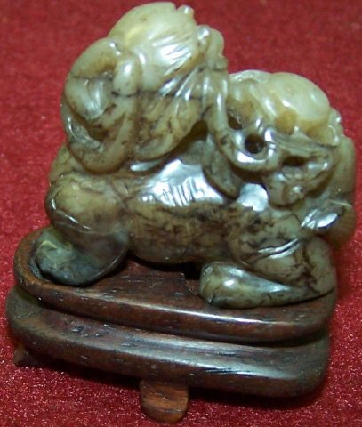* Chinese Carved Jade Sculpture: Foo dog and Oriental figure, approximate height 1 1/2".