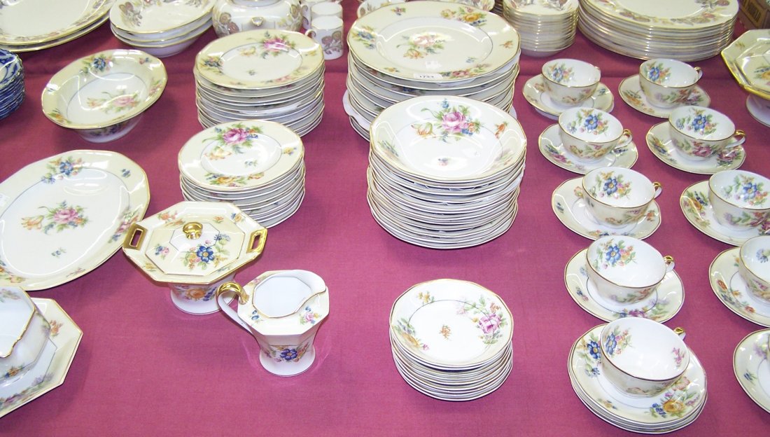 SET OF THEODORE HAVILAND DINNERWARE: "Rosegay" pattern, 12 dinner plates, approximate diameter 9 1/2", 12 salad plates, diameter 7 1/2", 12 soup bowls, diameter 7 1/2", 9 fruit bowls, diameter 5", 9 bread plates, diameter 6 1/2", 10 cups