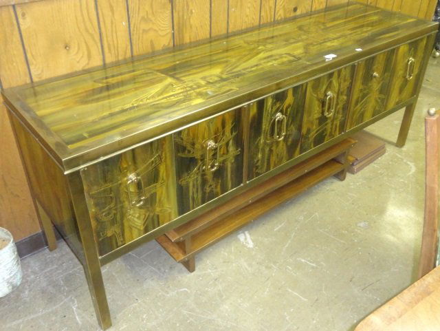 *BERNARD ROHNE MASTERCRAFT CREDENZA: Bernard Rohne, acid-etched brass six-panel credenza with brass pulls housed in a brass frame, approximate height 30", width 78" and depth 21",