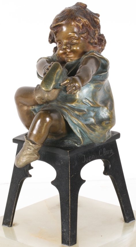 CLARA, JUAN: Seated girl, circa 1900, bronze sculpture raised on onyx base, approximate height 10 3/4".