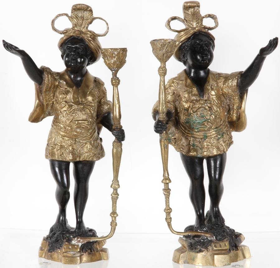 *PAIR OF BRONZED SCULPTURES: Depicting blackmoor with gilt and ebony finish, candle holders, approximate height 15 1/2"
