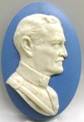GENERAL PERSHING JASPERWARE PLAQUE: Circa 1930, Relief molded bust of John J Pershing, marked on back "Zanesville Post # 29, American Leigon", manufactured by the Mosiac Tile Company, Zanesville, Oh, approximate length 5 1/8".