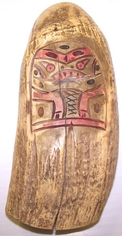 *WHALE'S TOOTH: With carved Inuit decoration.