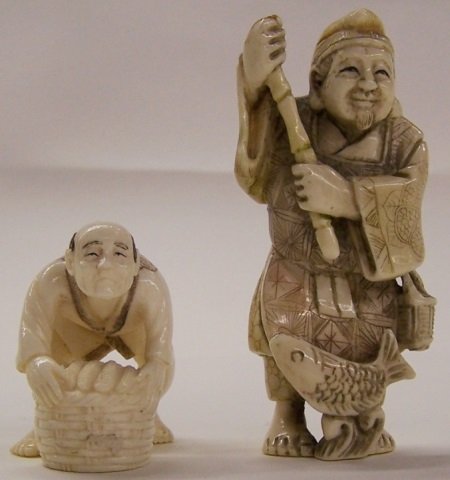 *2 CARVED IVORY NETSUKES: Man lifting basket and a fisherman holding pole, both signed on underside. Note: Items containing ivory will only be shipped domestically and cannot be shipped to California.