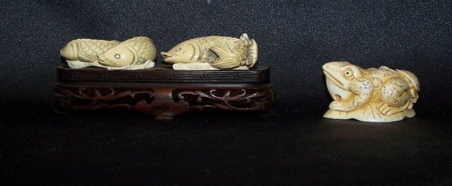 3 CARVED IVORY FIGURES: Figural netsuke depicting frog and turtle, and 2 ivory figures depicting fish. Note: Items containing ivory will only be shipped domestically and cannot be shipped to California.