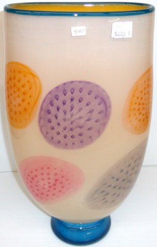 CONTEMPORARY ART GLASS VASE: Having peach ground with multi colored motif and blue base, approximate height 14 1/2".