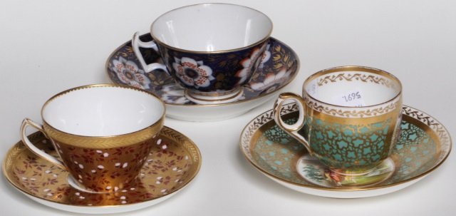 *3 CUPS & SAUCERS: Duke 1860 decorated with courting scene, Wedgwood 1880's with gilt ground and floral decoration, and Newhall with cobalt and rust ground, marked on underside.