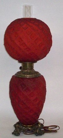 *GONE WITH THE WIND STYLE LAMP: Having frosted ruby glass shade and base.