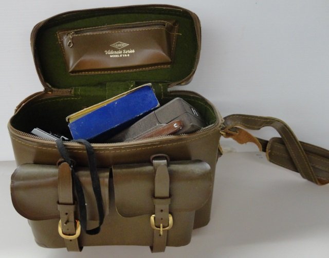 *GROUP OF CAMERAS AND EQUIPMENT: Bell and Howell, 16mm movie camera, Kodak Instamatic 404 camera, light meter, etc.