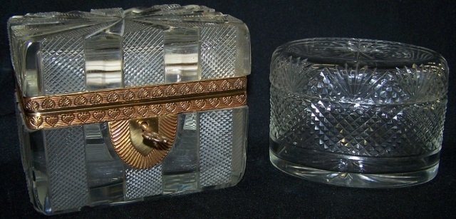 *2 CUT GLASS DRESSER BOXES: Oval form approximate height 3" and 1 with hinged top and brass clad height 4".