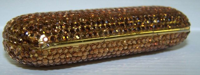 *JUDITH LEIBER TRINKET BOX: Clutch purse, brown and white, approximate height 1 1/4".