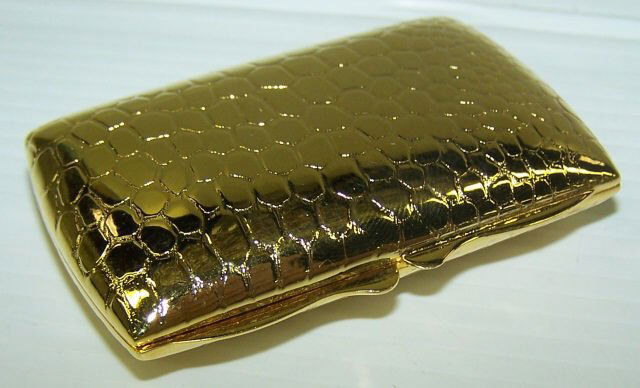 *JUDITH LEIBER TRINKET BOX: Clutch purse, approximate height 1 1/2".