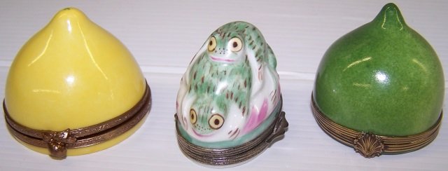 *3 LIMOGES PORCELAIN TRINKET BOXES: Lemon half, approximate height 1 3/4", half lime, height 1 3/4" and frogs, height 1 1/2".