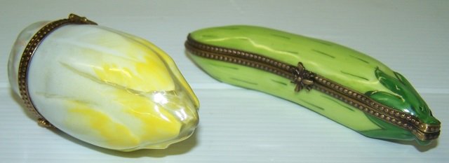 *2 LIMOGES PORCELAIN TRINKET BOXES: Peapod, approximate length 4 1/2" and artichoke, height 3 1/4".