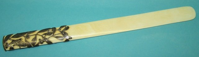 *IVORY LETTER OPENER: Having silver overlay, approximate length 12 3/4". Note: Items containing ivory will only be shipped domestically and cannot be shipped to California.