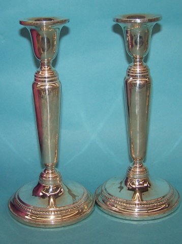 *STERLING SILVER CANDLESTICKS: By Revere Silversmiths, marked on underside #1046.