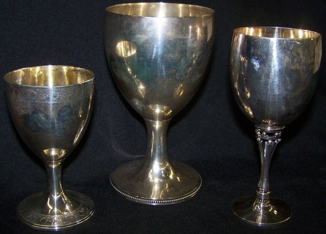 *3 STERLING SILVER WINES: 1 numbered on underside #3521, approximate height 6 1/2", 1 Georg Jensen #532B, approximate height 6" and 1 English dated 1794, London hallmark 1794, silversmith mark illegible.