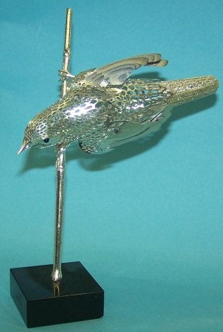 *CHRISTOFLE SILVERED BIRD FIGURE: "Reed Warbler", approximate height 7 1/2".