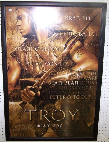 *AUTOGRAPHED "TROY" MOVIE POSTER: Signed by cast members, Brad Pitt, Orlando Bloom, Eric Bana, Sean Bean, approximately 41" x 27", (originally sold for charity organization Clothes Off Our Back).