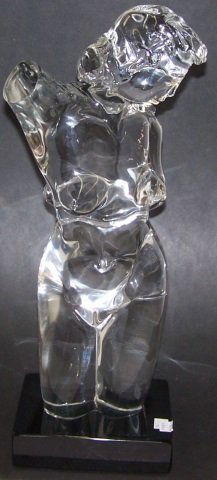 *CONTEMPORARY GLASS SCULPTURE: Female torso raised on ebony base with etched signature, illegible, approximate height 21".