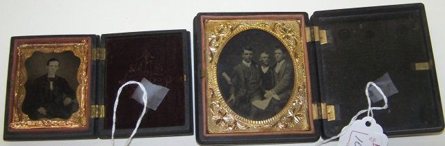 *2 DAGUERREOTYPES IN GUTTA PERCHA CASES: Portrait of seated man, approximately 3" x 2 1/2", and portrait of 3 young men, 3 3/4" x 3 3/8".