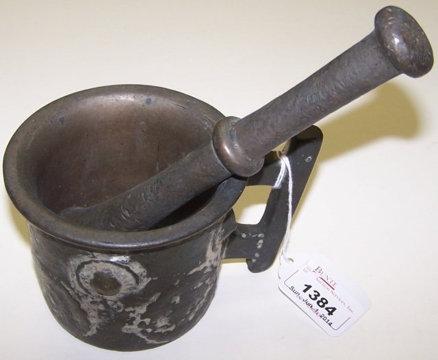 *ANTIQUE BRONZE MORTAR AND PESTLE: Fitted with single handle, approximate mortar height 3 1/2", pestle length 7 3/4".