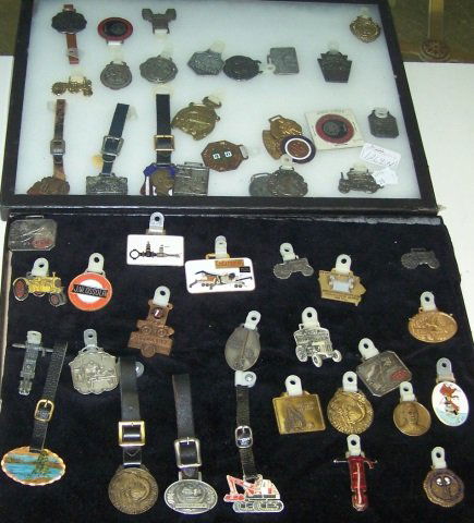 APPROXIMATELY 50 POCKET WATCH FOBS: Ford Industrial Tractors and Equipment, American Truck Cranes, Caterpillar, etc.