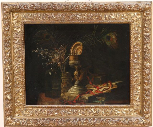 *UNKNOWN ARTIST: (Ca. late 18th C./early 19th. C. Dutch) Still life with silver chalice, books, and peacock feathers in vase, framed oil on canvas mounted to newer piece of cardboard, approximate image size 21 3/4" x