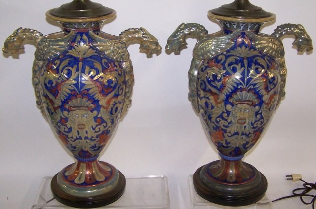 *PAIR OF ITALIAN LUSTREWARE VASES: Decorated with flora and scroll work and having dragon form handles, mounted as table lamps, approximate height of vase 17".