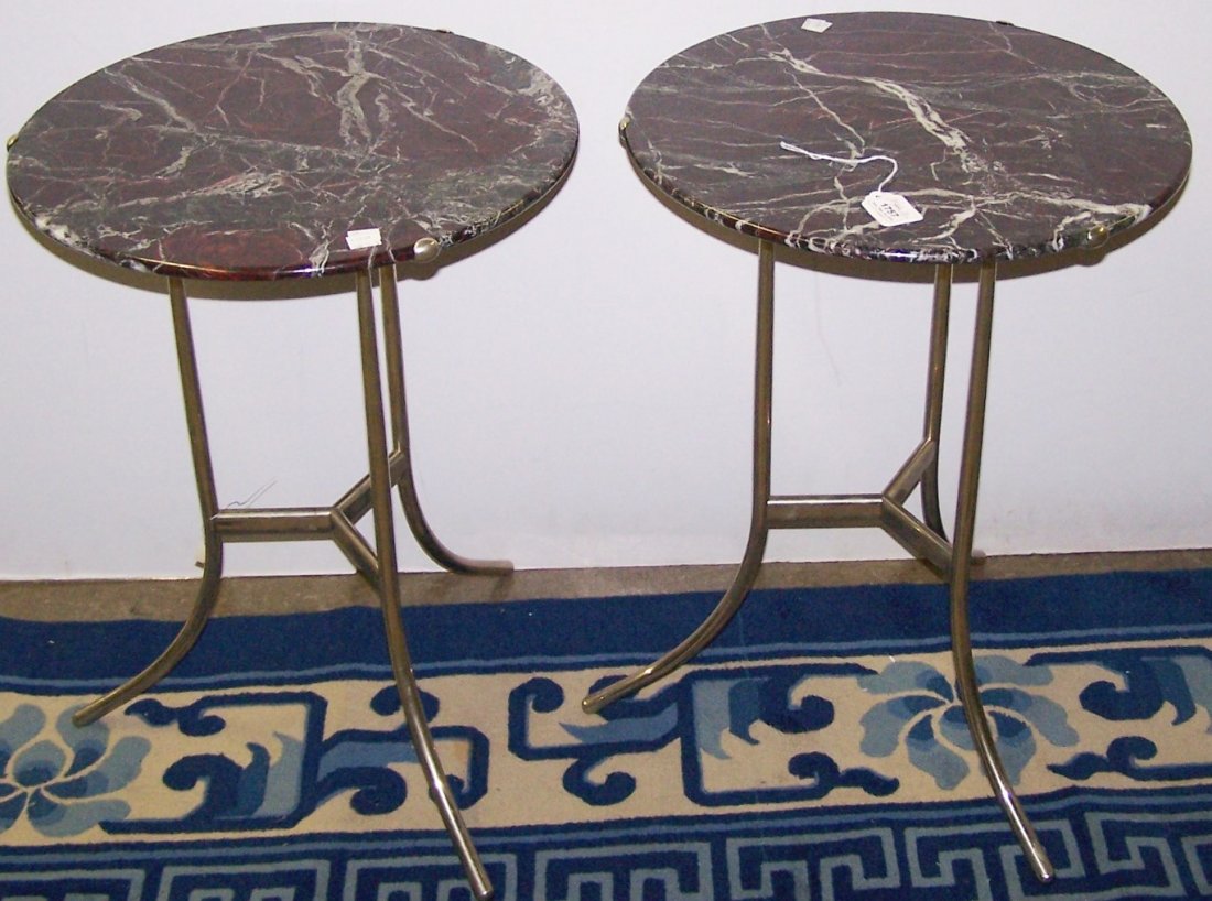 *PAIR OF CEDRIC HARTMAN OCCASIONAL TABLES: Having circular marble top raised on 3 sabre legs joined with stretcher, #980286, approximate height 21 1/2", diameter 17".