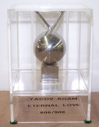 *AGAM, YAACOV: "Eternal Love", kinetic sculpture, #606/900, approximate size of case 6" x 4" x 4".