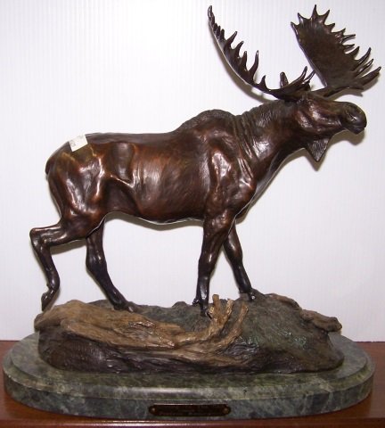 *AFTER FREDERIC REMINGTON: Bronze sculpture, "Coming to the Call", signed (inspired by Frederic Remington). approximate height 14 3/4" length 14 3/4".