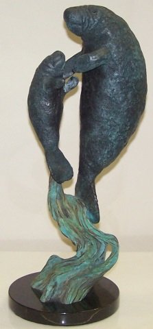 *WYLAND, ROBERT: "Endangered Manatees", bronze sculpture, signed and numbered 73/374, approximate height 16 1/2".